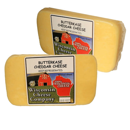 Two blocks of Butterkase Cheddar Cheese