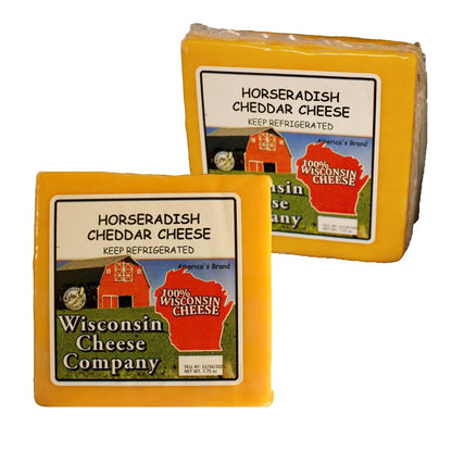 Two blocks of Horseradish Cheddar Cheese