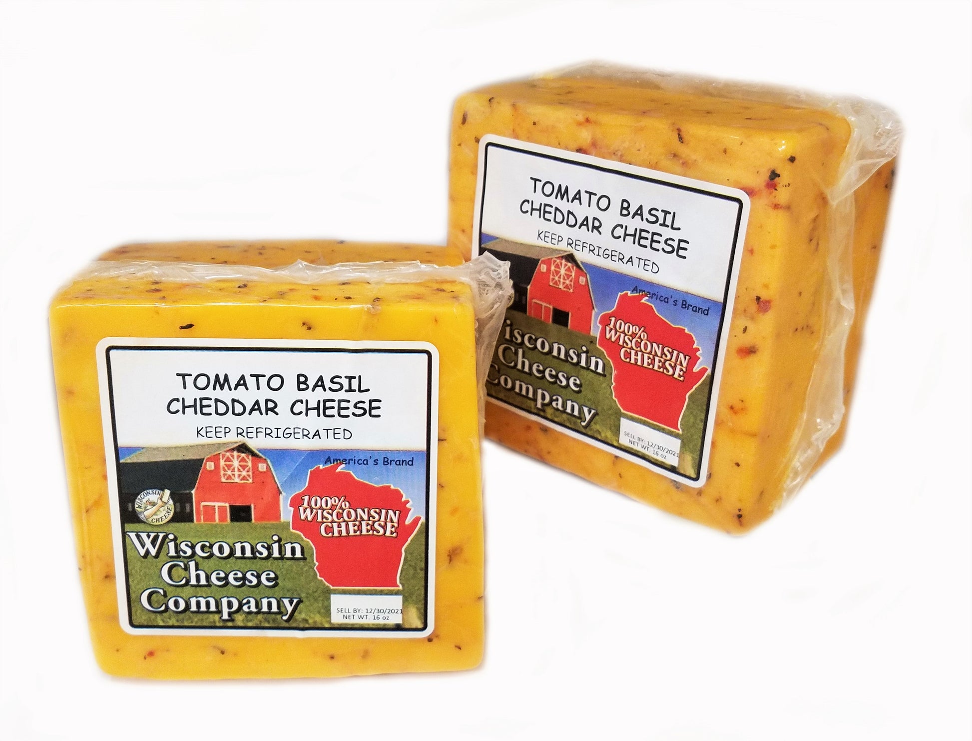 Two blocks of Tomato Basil Cheddar Cheese